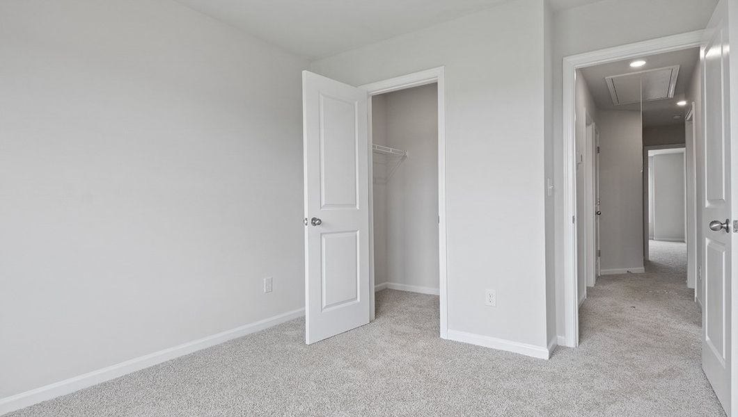 Spacious, unfurnished interior of a new home in Townes at Tap Root Farms, Fletcher (Image 16). Spacious, unfurnished interior of a new home in Townes at Tap Root Farms, Fletcher (Image 16).