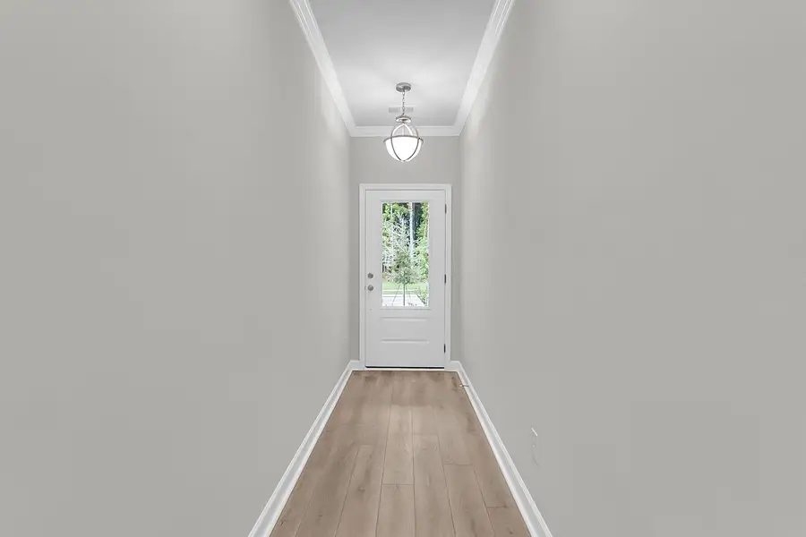 Spacious, unfurnished interior of a new home in Pineland Preserve, Summerville (Image 18).