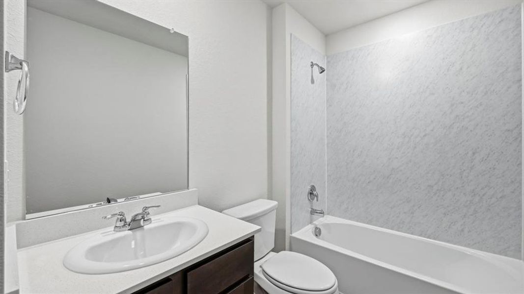 Bathroom with vanity and shower / tub combination Bathroom with vanity and shower / tub combination