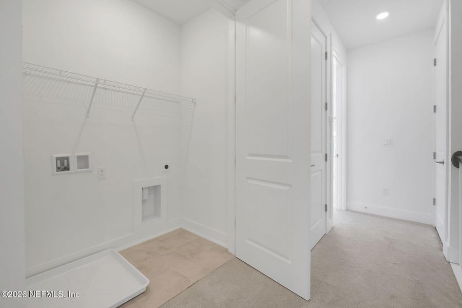 Spacious, unfurnished interior of a new home in North Beach Townhomes, Jacksonville Beach (Image 29).