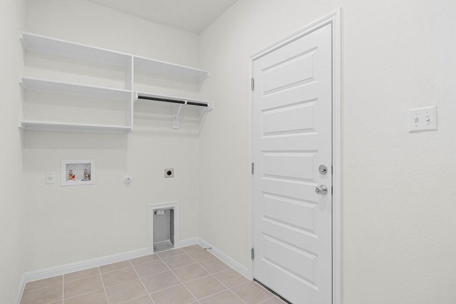 Utility Room in the Magnolia home plan by Trophy Signature Homes – REPRESENTATIVE PHOTO