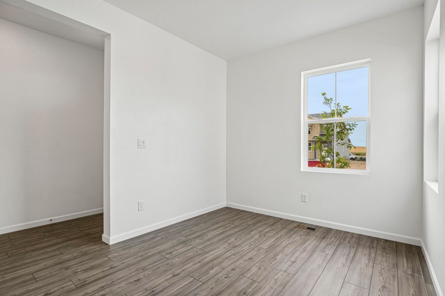 Spacious, unfurnished interior of a new home in Sky Ranch, Watkins (Image 13).