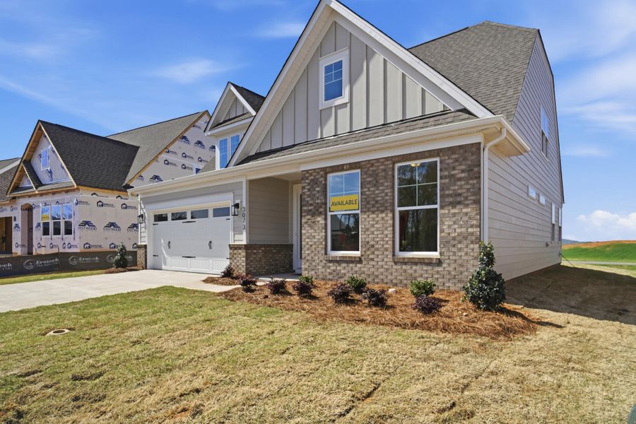 Front exterior of a new home in Founders Landing | 55+ Community, Gastonia, NC, highlighting curb appeal (Image 21). Front exterior of a new home in Founders Landing | 55+ Community, Gastonia, NC, highlighting curb appeal (Image 21).