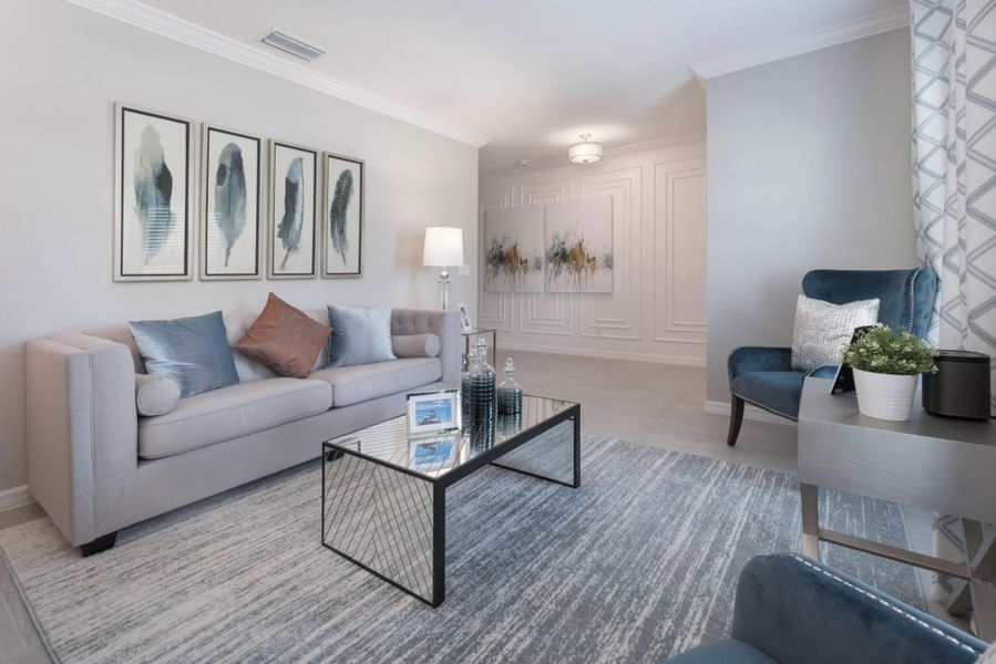 Representative furnished interior of a home built from the Kensington Flex by Risewell Homes in Park View at the Hills, Minneola (Image 18).