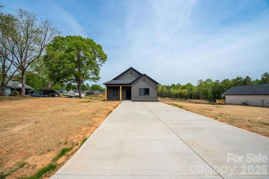 Front exterior of a new home in , Lincolnton, NC, highlighting curb appeal (Image 1). Front exterior of a new home in , Lincolnton, NC, highlighting curb appeal (Image 1).