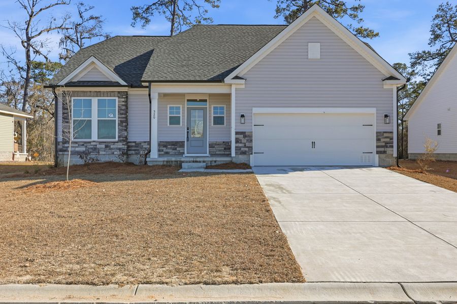 Representative exterior photo of a completed home built from the Montague II by Great Southern Homes in Oak Hollow, Longs, SC (Image 20).
