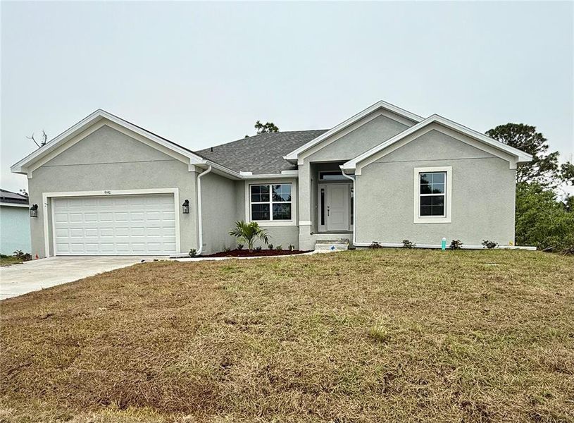 Front exterior of a new home in South Gulf Cove, Port Charlotte, FL, highlighting curb appeal (Image 1). Front exterior of a new home in South Gulf Cove, Port Charlotte, FL, highlighting curb appeal (Image 1).