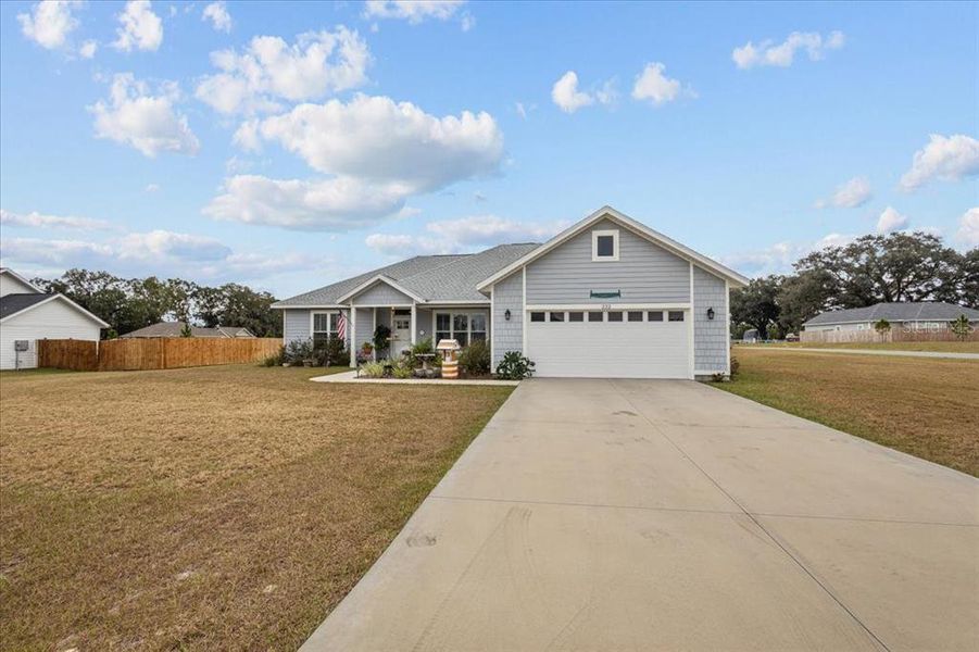Front exterior of a new home in , Trenton, FL, highlighting curb appeal (Image 2).