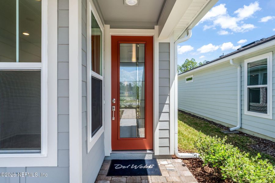 Exterior details and patio area of a home in Del Webb Wildlight, Yulee (Image 25).