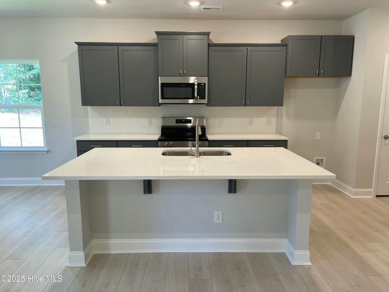 Furnished interior view inside a new home in Wood Creek, Leland (Image 4).