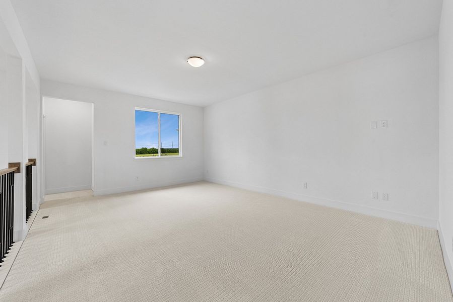 Representative unfurnished interior of a home built from the Ellis by Landon Homes in Fields - East Village, Frisco (Image 23).