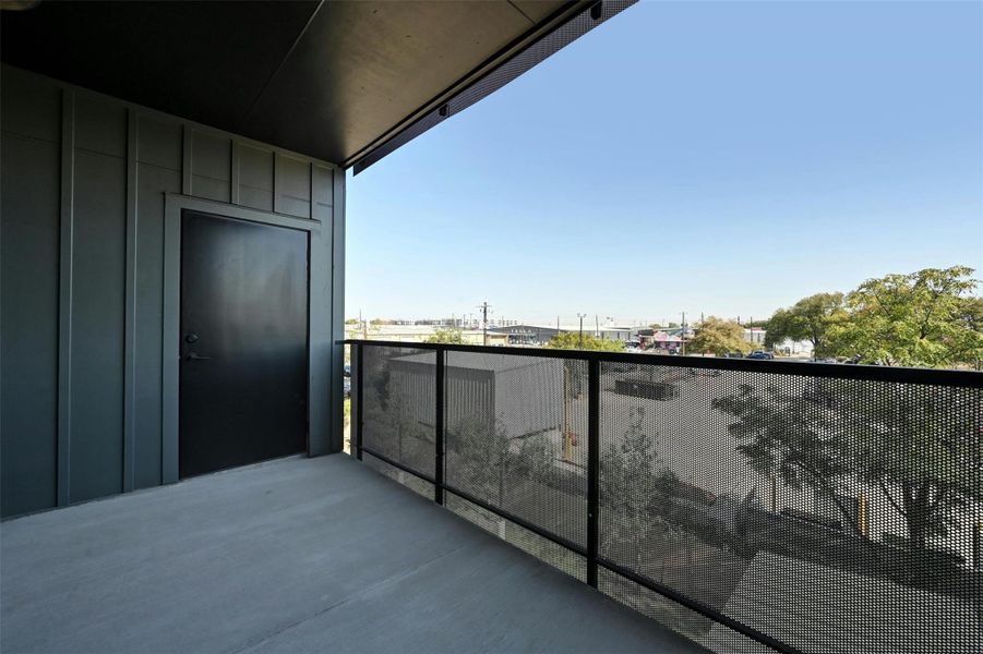 Another view of the patio. The unit faces north with downtown views.