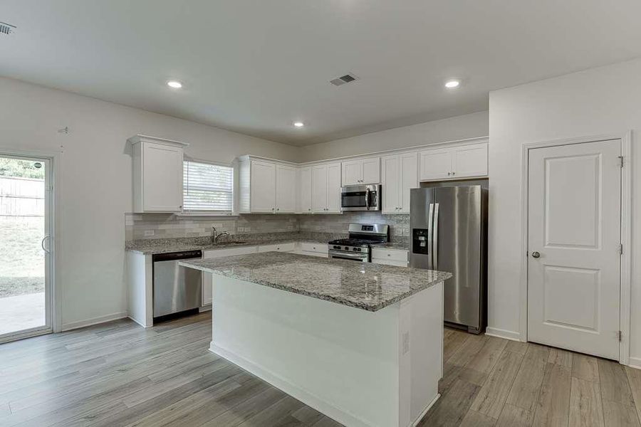 Furnished interior view inside a new home in , Loganville (Image 7). Furnished interior view inside a new home in , Loganville (Image 7).