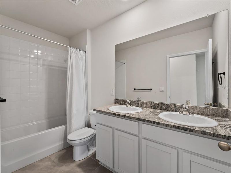 Furnished interior view inside a new home in Star Farms at Lakewood Ranch, Bradenton (Image 39).