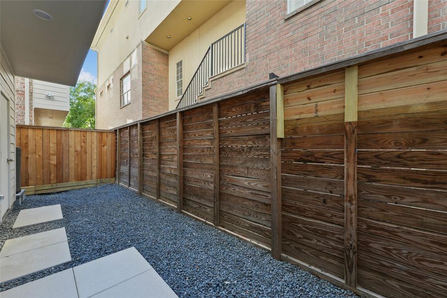 Exterior details and patio area of a home in , Houston (Image 4).