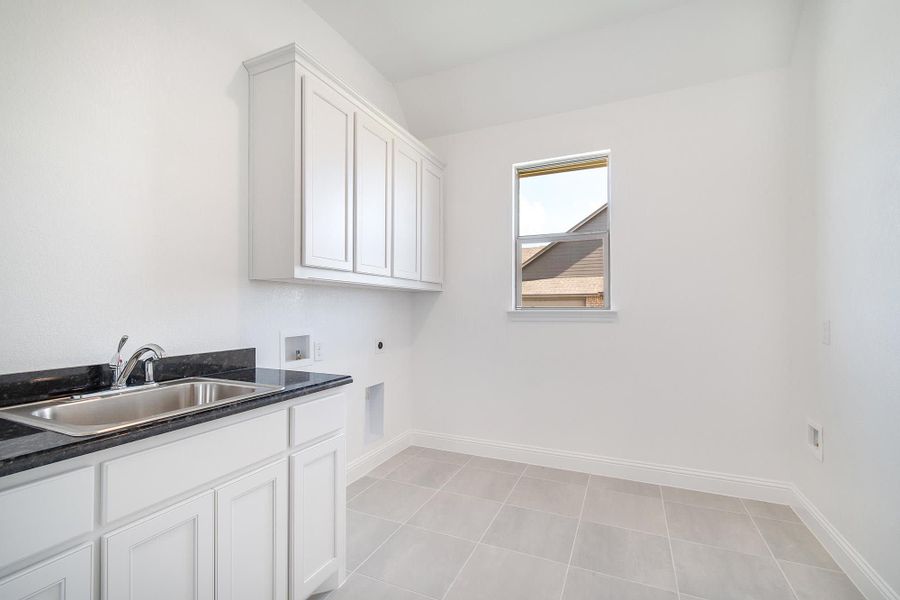 Laundry Room | Concept 3634 at Hidden Creek Estates in Van Alstyne, TX by Landsea Homes