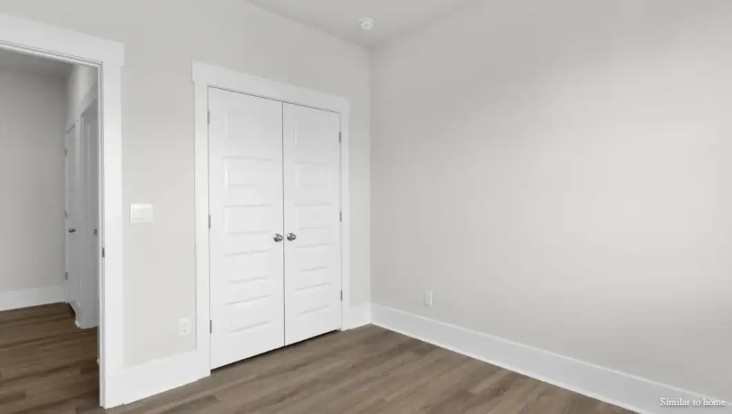 Spacious, unfurnished interior of a new home in The Highlands at Cedar Hill Landing, Navassa (Image 30).