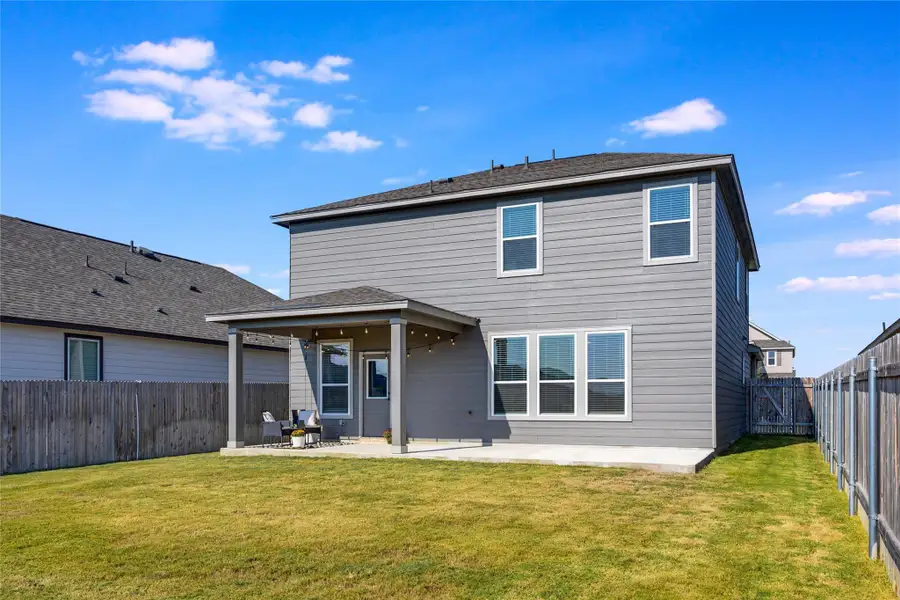 Front exterior of a new home in Retreat at San Gabriel, Georgetown, TX, highlighting curb appeal (Image 2).