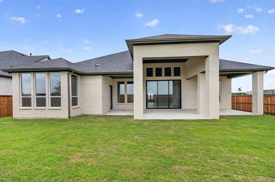 Exterior details and patio area of a home in The Parks at Wilson Creek, Celina (Image 3).