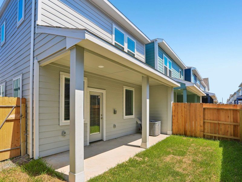 Exterior details and patio area of a home in Kemah Crossing - City Series, Kemah (Image 3).