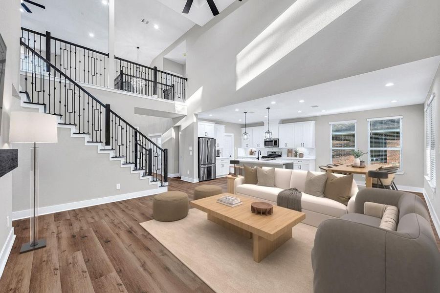 Gorgeous living area with high ceilings and ample space for entertaining. (This photo is virtually staged)