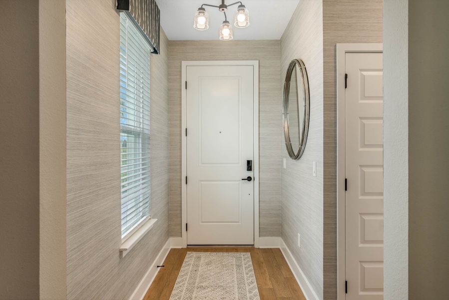 Furnished interior view inside a new home in Harvest at Ovation - Townhomes, Winter Garden (Image 28).
