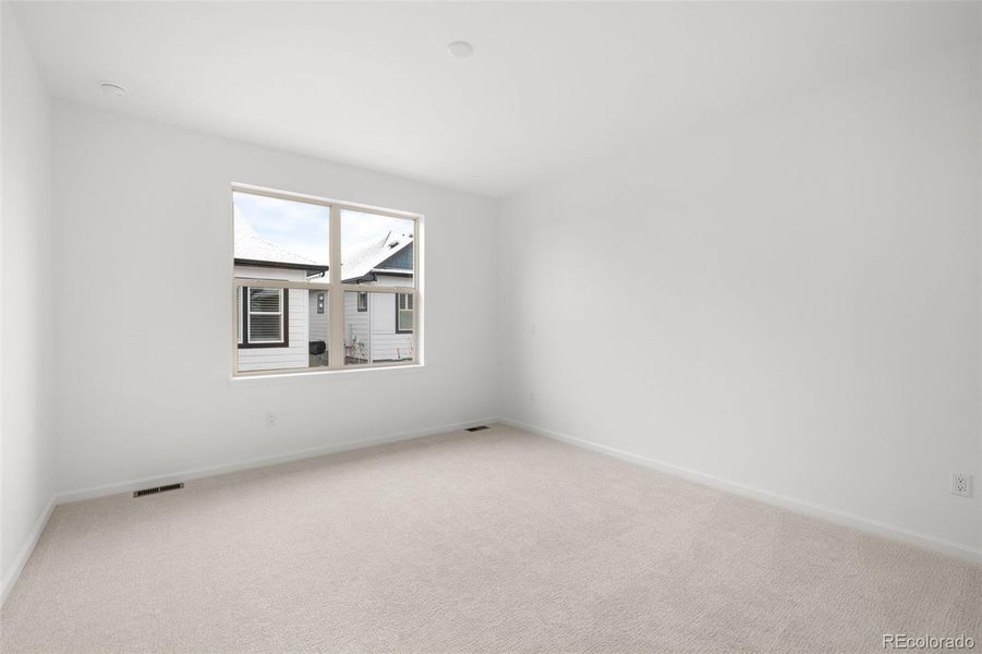 Spacious, unfurnished interior of a new home in Deer Creek, Littleton (Image 24).