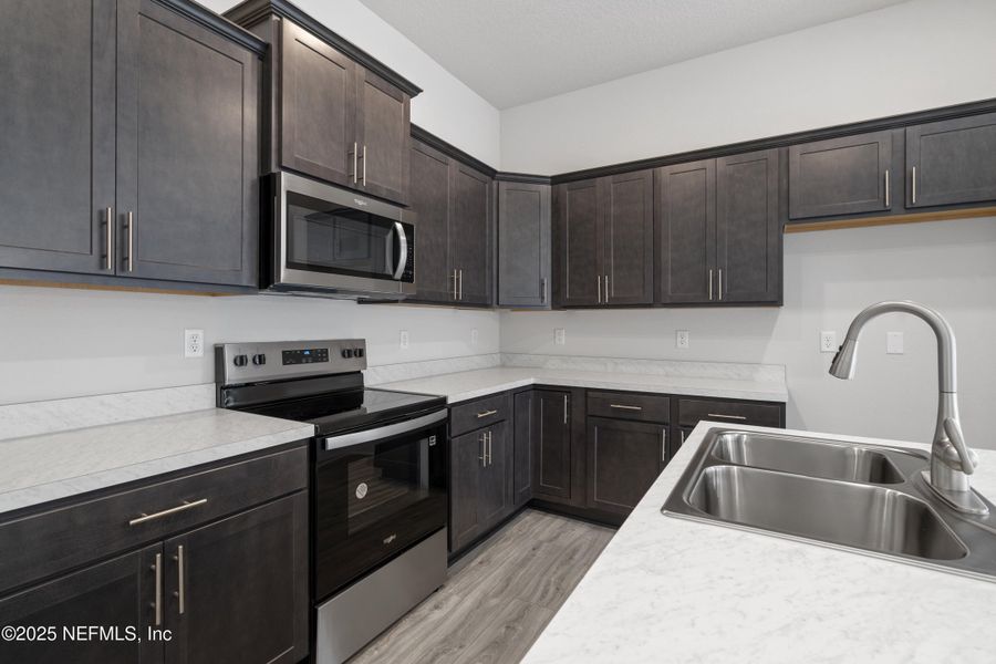 Furnished interior view inside a new home in Summerglen, Jacksonville (Image 2). Furnished interior view inside a new home in Summerglen, Jacksonville (Image 2).