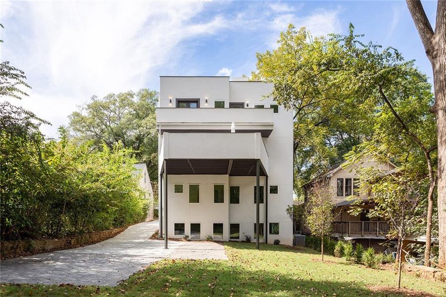 Front exterior of a new home in , Atlanta, GA, highlighting curb appeal (Image 40).