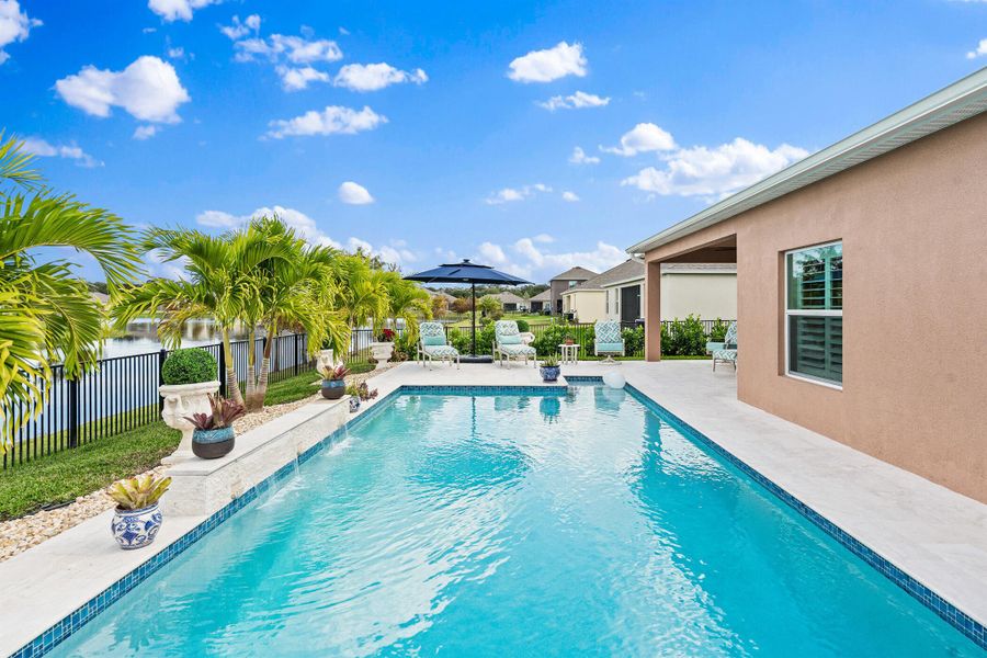 Exterior details and patio area of a home in Grande Hammock, Vero Beach (Image 26). Exterior details and patio area of a home in Grande Hammock, Vero Beach (Image 26).
