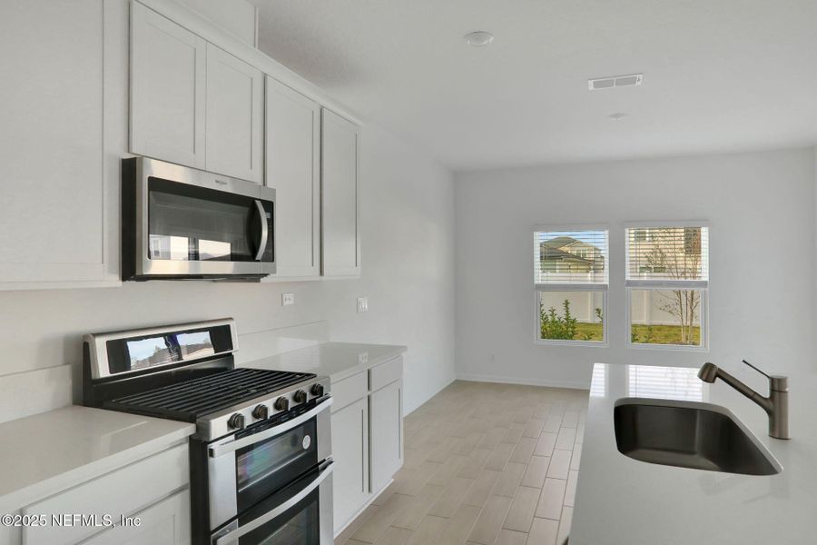 Furnished interior view inside a new home in Cordova Palms, St. Augustine (Image 15).