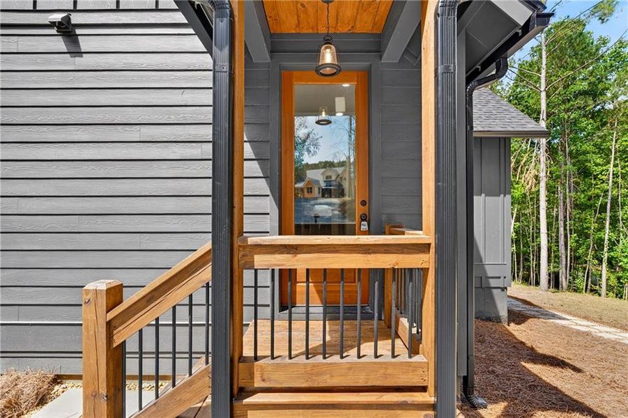 Exterior details and patio area of a home in , Ellijay (Image 32).