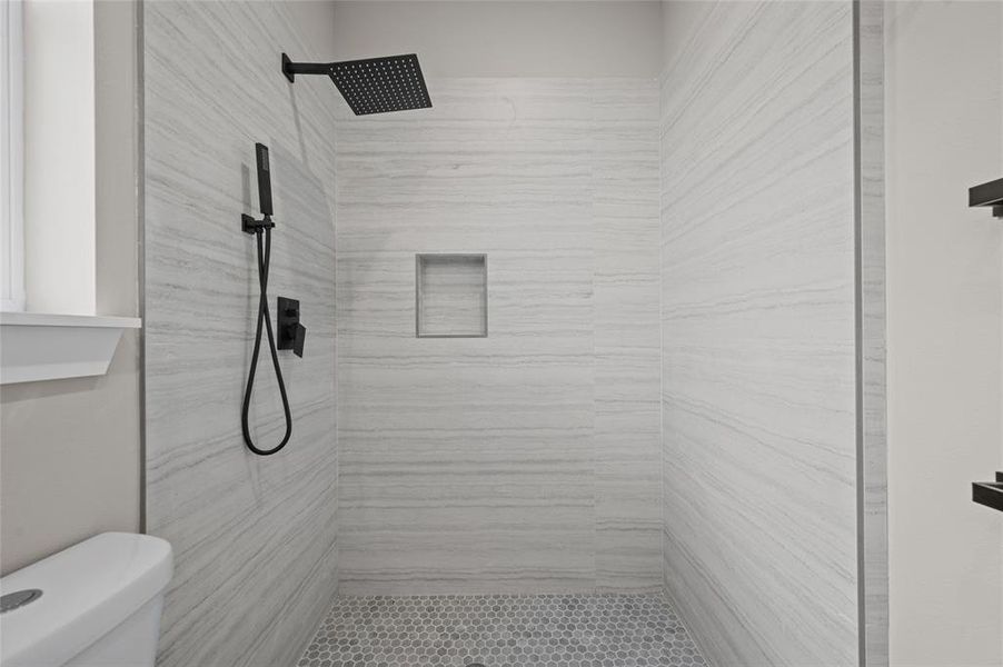 Large shower with rain head and wand