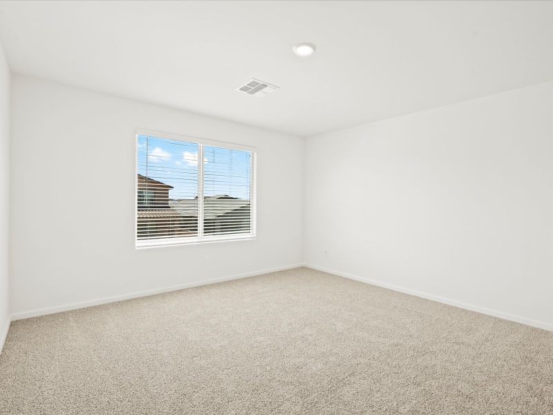 Spacious, unfurnished interior of a new home in Mandarina - Signature Series, Marana (Image 14).