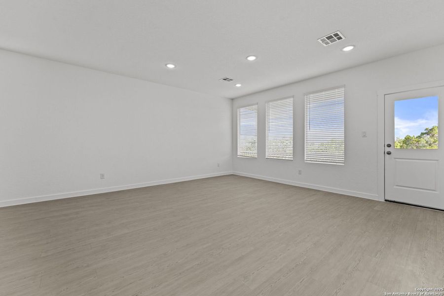 Spacious, unfurnished interior of a new home in Waterwheel: Coastline Collection, San Antonio (Image 17).