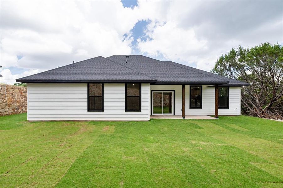 Exterior details and patio area of a home in , Granbury (Image 26).