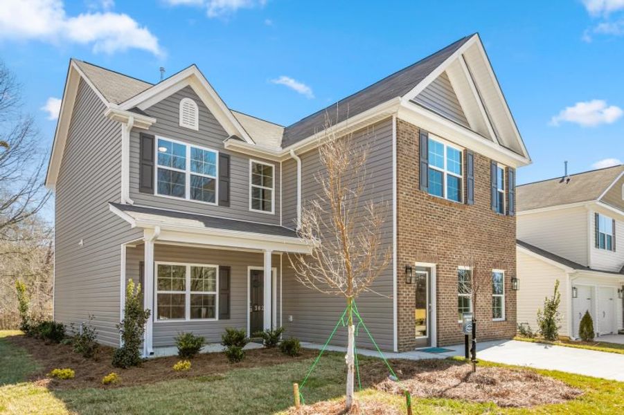 Representative exterior photo of a completed home built from the Greensboro by Keystone Homes NC in Brassfield Meadows, Burlington, NC (Image 33). Representative exterior photo of a completed home built from the Greensboro by Keystone Homes NC in Brassfield Meadows, Burlington, NC (Image 33).