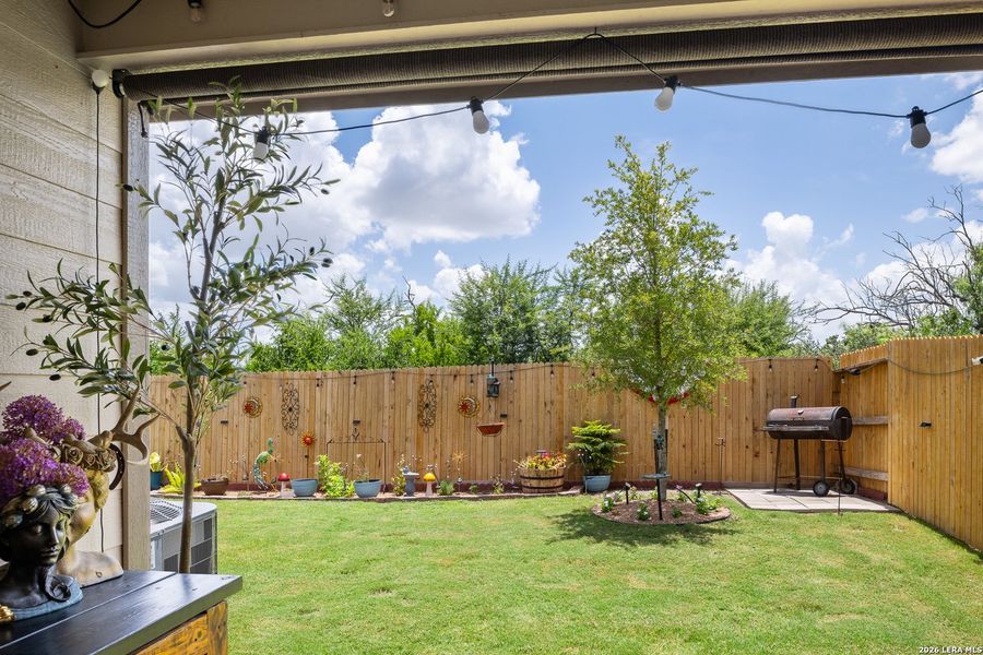 Exterior details and patio area of a home in Hightop Ridge, Converse (Image 20).