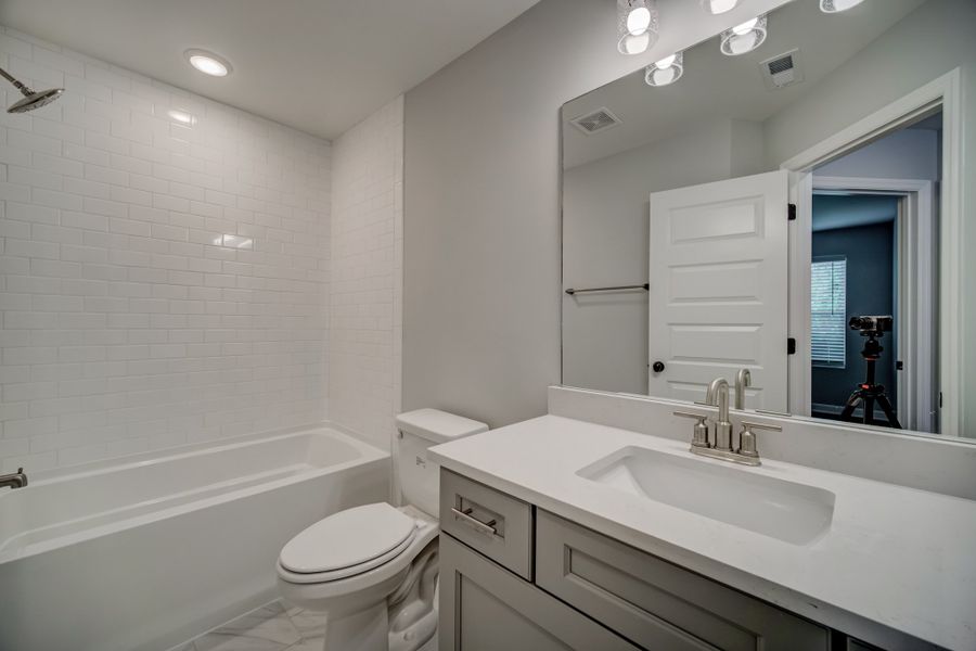 Representative furnished interior of a home built from the Draper by Parkside Builders in The Woods, Gallatin (Image 13).