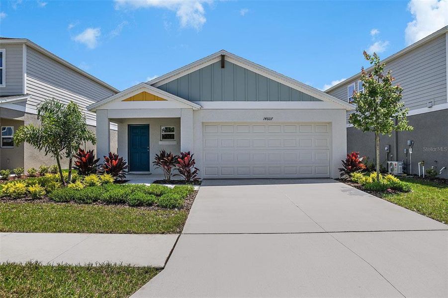 Front exterior of a new home in Wynnstone, Davenport, FL, highlighting curb appeal (Image 1). Front exterior of a new home in Wynnstone, Davenport, FL, highlighting curb appeal (Image 1).