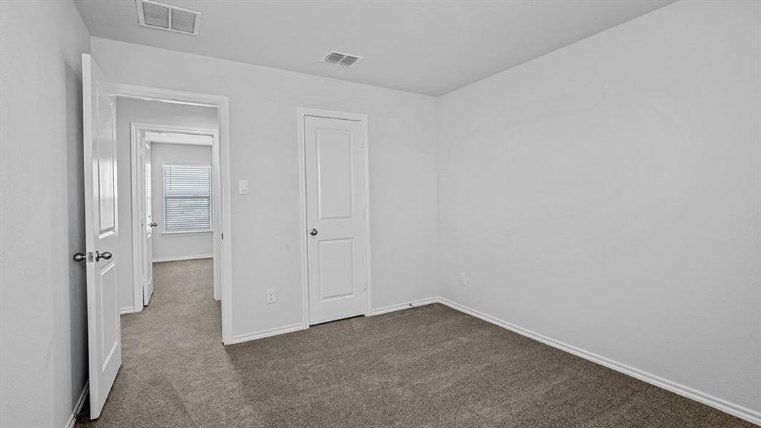 Spacious, unfurnished interior of a new home in Springhill South, Boyd (Image 30).