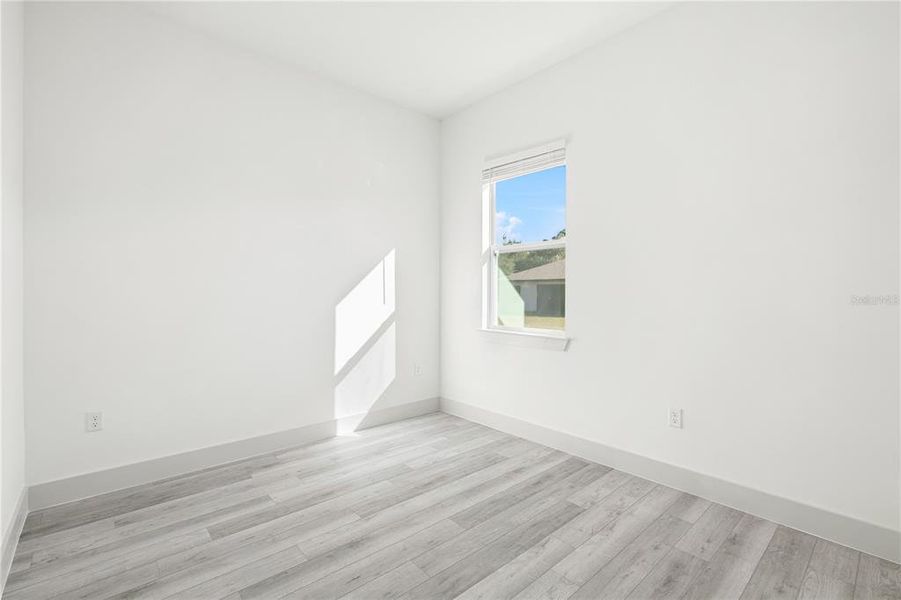 Spacious, unfurnished interior of a new home in , Port Charlotte (Image 37).