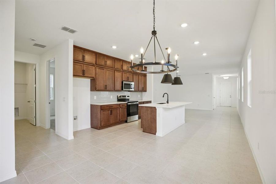 Furnished interior view inside a new home in , Winter Garden (Image 5).