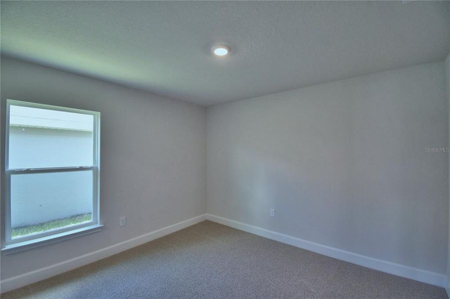 Spacious, unfurnished interior of a new home in Cadence Crossing, Auburndale (Image 19).