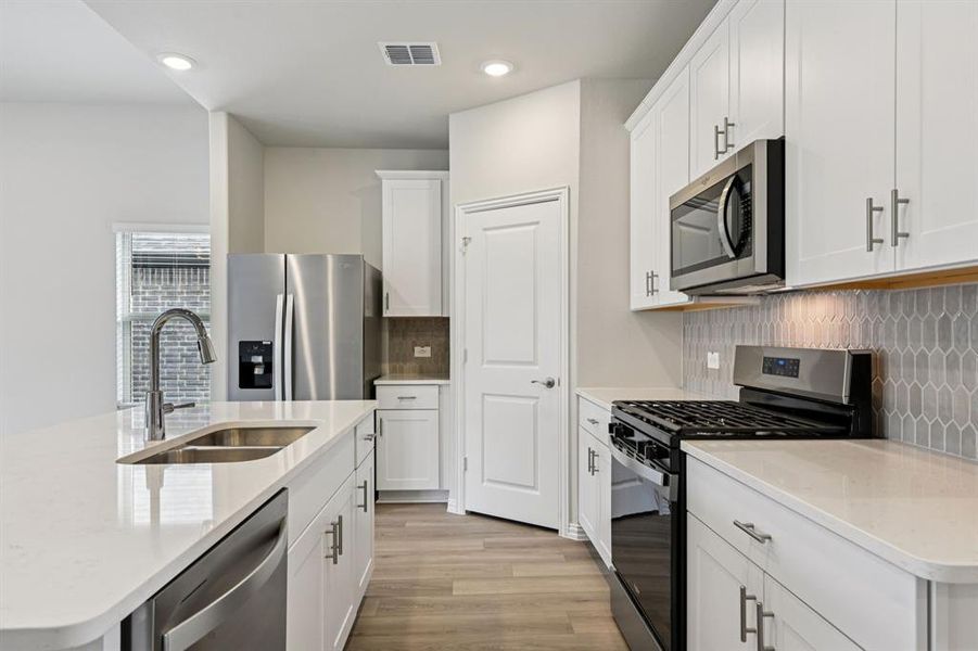 Furnished interior view inside a new home in Parks at Foster Crossing - Signature Series, Anna (Image 10).