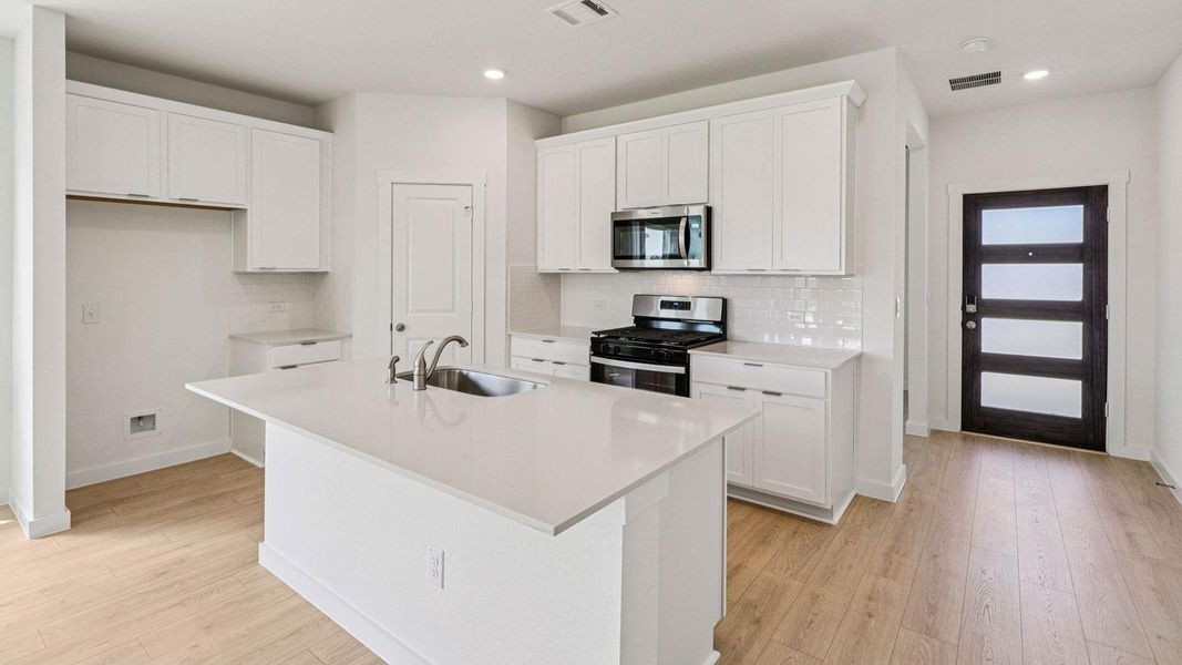 Furnished interior view inside a new home in Monarch Ranch, Manor (Image 10).