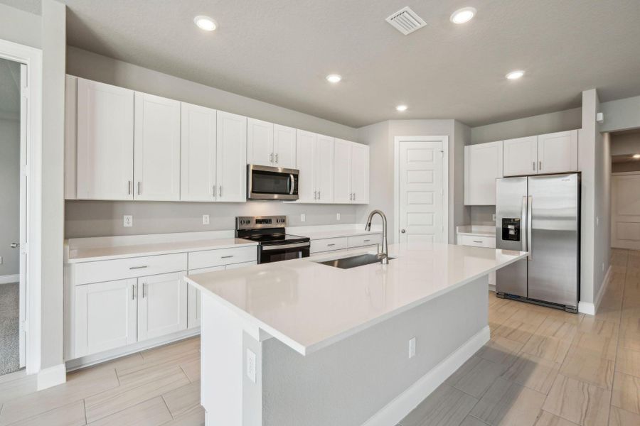 Furnished interior view inside a new home in Brystol at Wylder - Reserve Series, Port St. Lucie (Image 6).