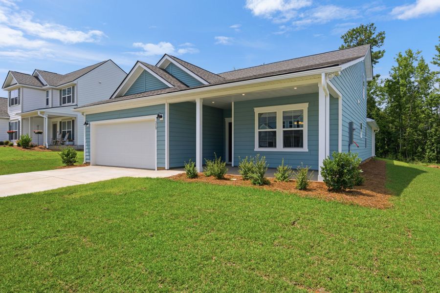 Front exterior of a new home in Carriage Estates, Lexington, SC, highlighting curb appeal (Image 21). Front exterior of a new home in Carriage Estates, Lexington, SC, highlighting curb appeal (Image 21).