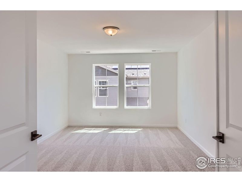 Double door primary bedroom