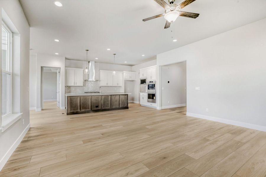 Spacious, unfurnished interior of a new home in RainDance, Windsor (Image 29).
